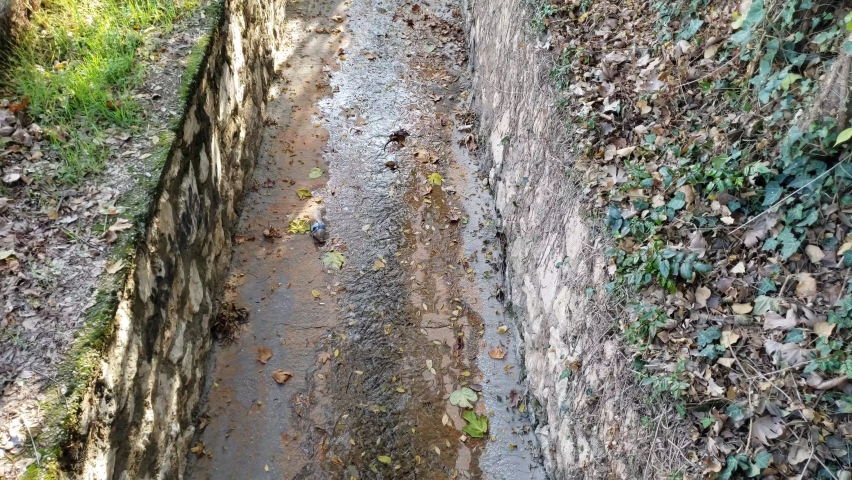 Climate change caused drought. artificial river with ivy walls. 4K 60fps video. Clean energy. Save water save world and energy. Climate control