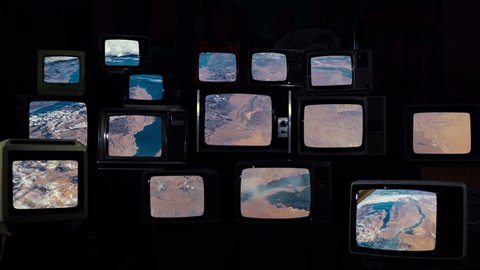 The Desert Nations of Egypt, Saudi Arabia, Israel and Jordan as Seen from Space on Stacked Vintage Televisions. Elements of this Video furnished by NASA. 4K Resolution.