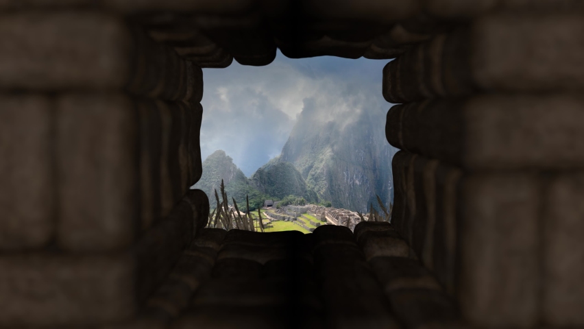 Machu Picchu - View of the ancient city through ruins window Royalty-Free Stock Footage #1067792873