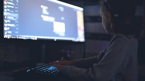 Child working on laptop, typing the text on a keyboard , online education concept. - Powered by Shutterstock - Get 15% off with code: PIKWIZARD15