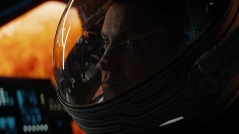 Portrait of a Caucasian male astronaut inside spaceship cockpit. Sci-fi space exploration concept. Mars mission. Shot with 2x Anamorphic lens.