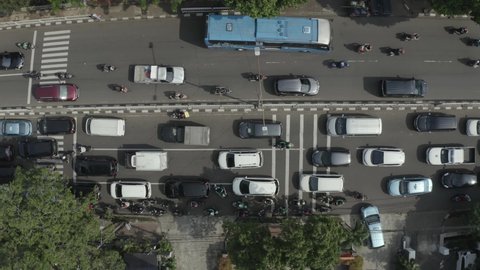 Overhead top down view of gridlock traffic in Jakarta Indonesia drone aerial