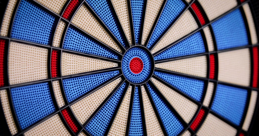 5 dart arrows closing but missing the target of the dart in a row - 4k video - The dart arrows hitting the near of the bullseye - electronic dart Royalty-Free Stock Footage #1067814812