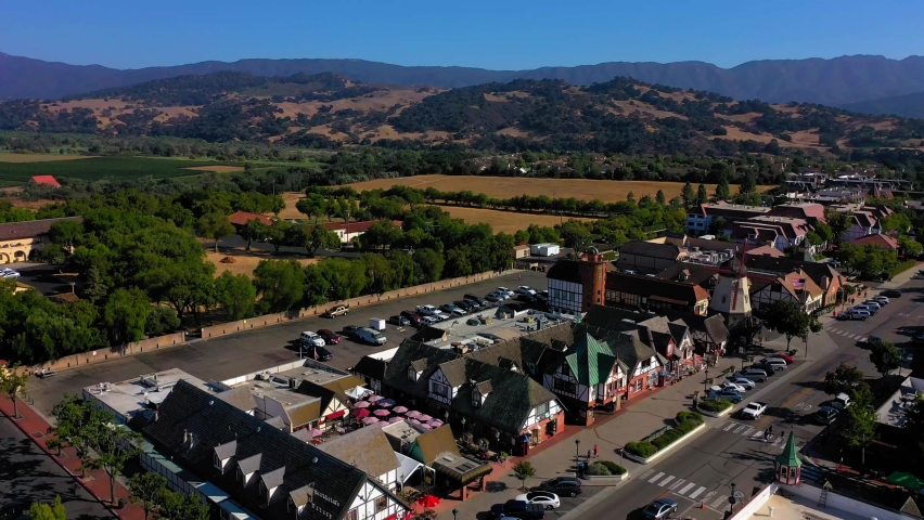 Flying towards the right of the main street in Solvang Ca