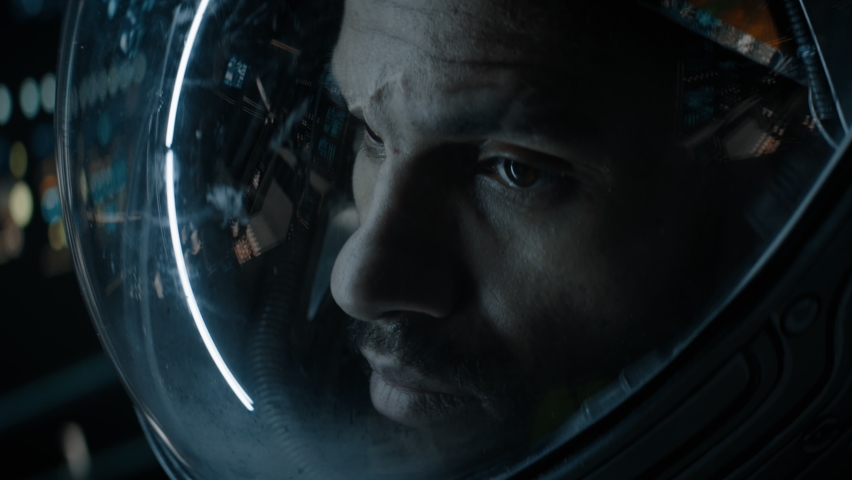 CU Portrait of African American Black male astronaut inside spaceship cockpit. Sci-fi space exploration concept. Mars mission. Shot with 2x anamorphic lens Royalty-Free Stock Footage #1067852408