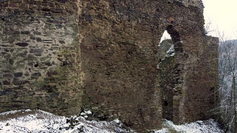 Winter Castle Ruins, Aerial, Drone flight Up, Castle Walls, Winter Forest