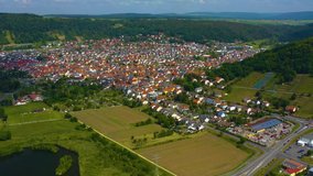 Aerial view of the city Grossheubach in Germany on a cloudy day in spring