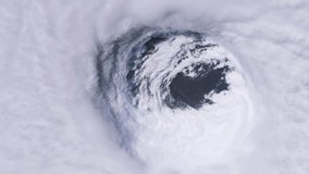 Eye Of Hurricane Seen from Space. Elements of this Video furnished by NASA. 4K Resolution.
