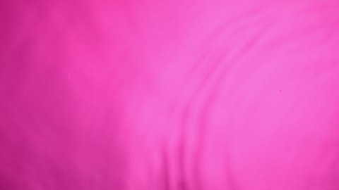 abstract pink color wavy water surface background