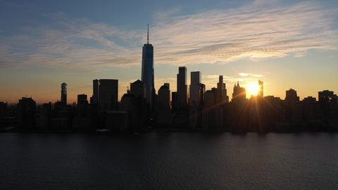 Urban Skyline of Lower Manhattan, New York at Sunrise. Aerial View. United States of America. Drone Flies Sideways