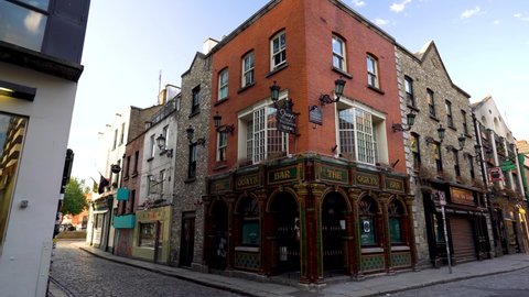 Dublin Ireland - January 28th 2021: Dublin Temple Bar a traditional tourist destination during coronavirus pandemic. Empty with closed irish bars.