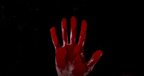 Help concept. Bloody hand hitting the window and slowly crawling down leaving the trace of blood on glass. Crime and violence concept of horror or nightmare of murder. Isolated on black background