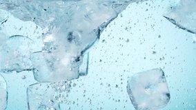 Super slow motion of rotating ice cubes in the  water. Filmed on high speed cinema camera, 1000 fps. - Powered by Shutterstock - Get 15% off with code: PIKWIZARD15