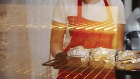 The chef puts gingerbread cookies in the oven. Close up view - Powered by Shutterstock - Get 15% off with code: PIKWIZARD15