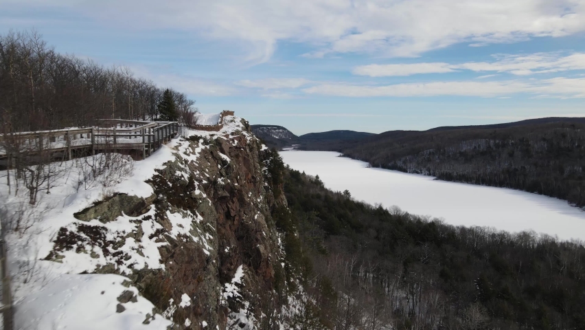Drone video of the Lake of the Clouds in winter located in the Porcupine Mountains in Michigan.