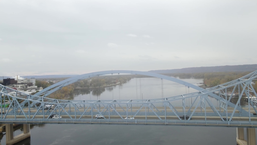 Aerial view of vehicles crossing the Mississippi River. Trucks crossing Cass Street Bridge in La Crosse, Wisconsin.