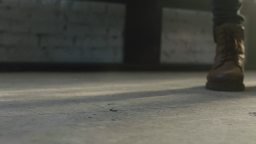 The cup falls to the floor and breaks into small pieces. Cup falling and breaking. Cup Smashes Slow Motion. Cup falling and exploding, Slow Motion 4K. 200 fps