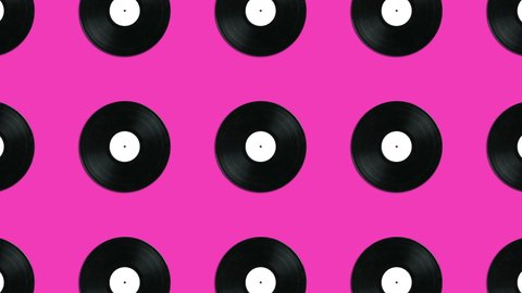 Geometric pattern with vintage vinyl disks on a pink background. Simple motion graphics music animation concept