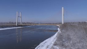 Siekierkowski Bridge in Warsaw during a Cold temperature winter day. Video from the drone.