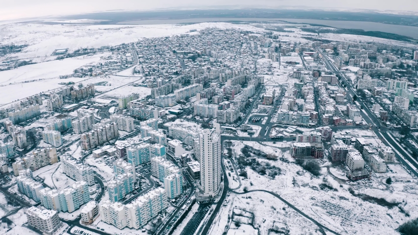 Aerial view over Burgas City Cloudy snowy day Landscape Black Sea and Burgas Lake Meden Rudnik quarter