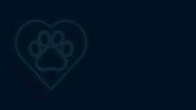 Glowing neon line Heart with animals footprint icon isolated on black background. Pet paw in heart. Love to the animals. 4K Video motion graphic animation.