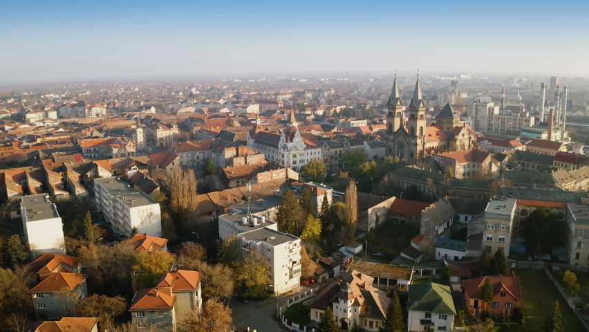 Aerial view of the Millennium Church with old and new buildings in Timisoara city - Romania; CCA. 2020 - during the COVID-19 pandemic.