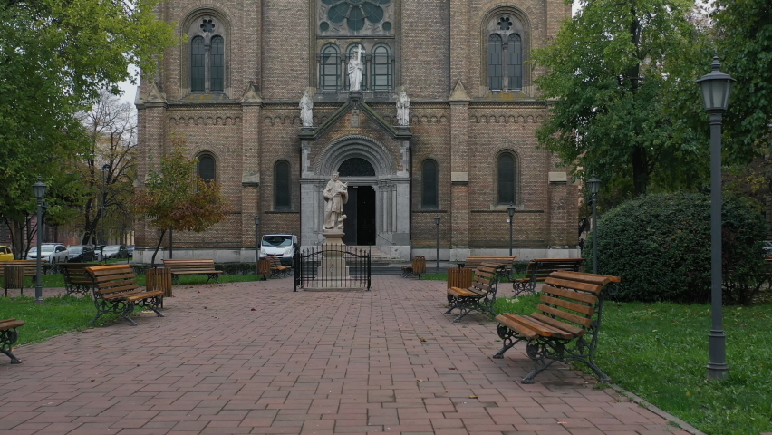 Aerial view of the Millennium Church with old and new buildings in Timisoara city - Romania; CCA. 2020 - during the COVID-19 pandemic.