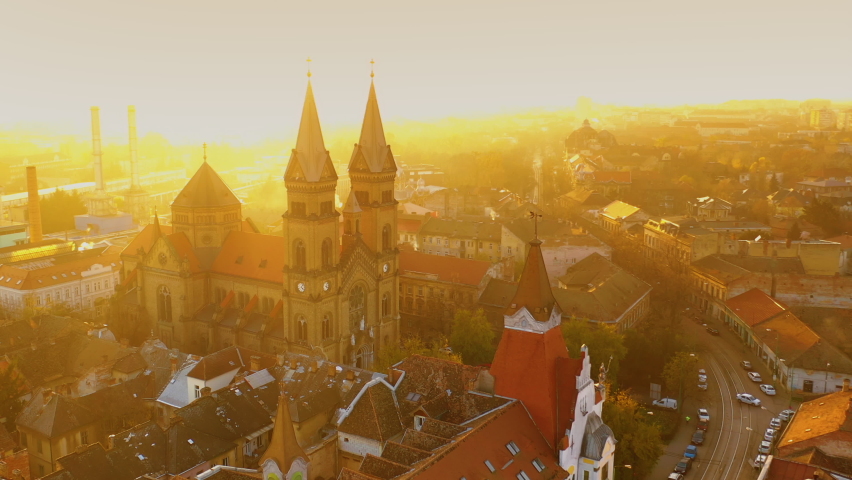 Aerial view of the Millennium Church with old and new buildings in Timisoara city - Romania; CCA. 2020 - during the COVID-19 pandemic.