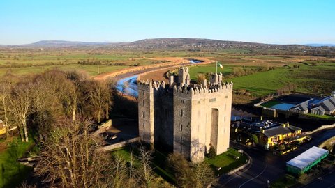 Bunratty Castle and Durty Nelly's Pub, Ireland - Jan 3rd 2021: Aerial view over a beautiful location in County Clare, on the banks of the River Ralty. Bunratty village in County Clare, Ireland.