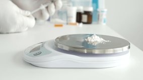 Blurred Shooting with a Doctor Checking a Syringe for Covid Vaccine in Background - Powered by Shutterstock - Get 15% off with code: PIKWIZARD15