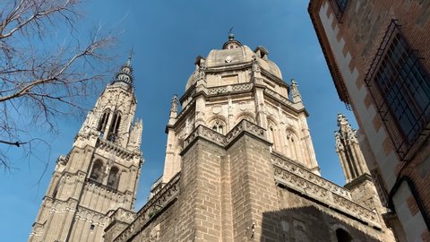 Tilt down camera movement of Toledo cathedral on a sunny day, Toledo, Spain. High quality 4k footage