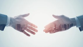 Silhouette of men shaking hands and modern cityscape. Double exposure. - Powered by Shutterstock - Get 15% off with code: PIKWIZARD15