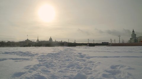 Severe frosts in St. Petersburg. The frozen river Neva in the afternoon. Saint Isaac's Cathedral