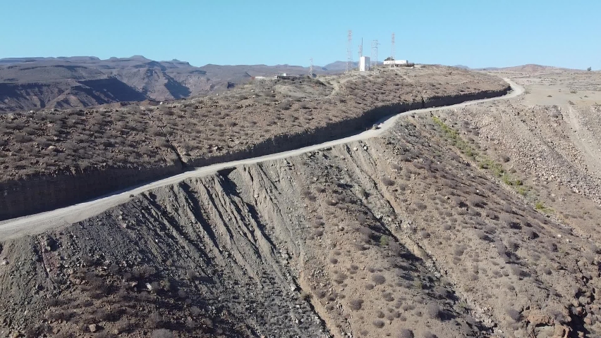 Aerial view of a large urbanization of summer houses in the town of Puerto Rico de Gran Canaria. Spain