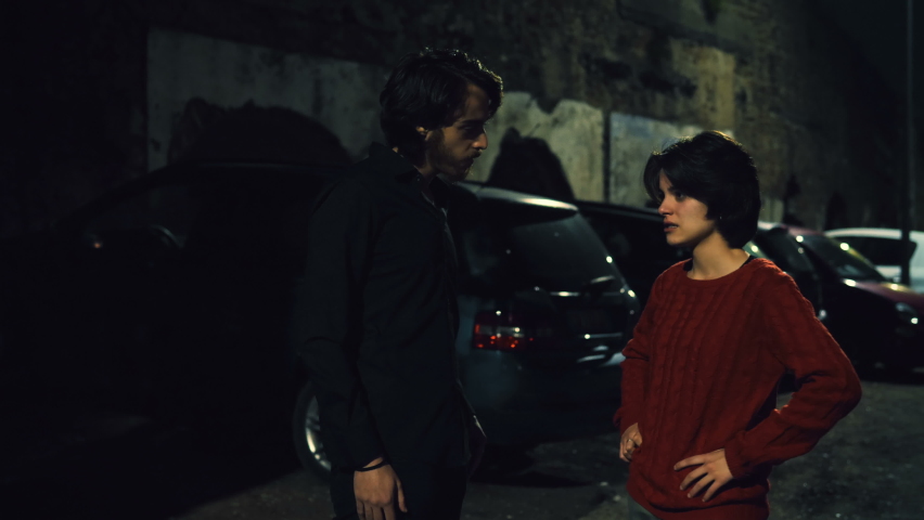 jealousy, anger - girl makes a jealous scene at her boyfriend in the street