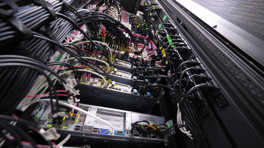 The server room has a lot of wires. Royalty-Free Stock Footage #1068043436