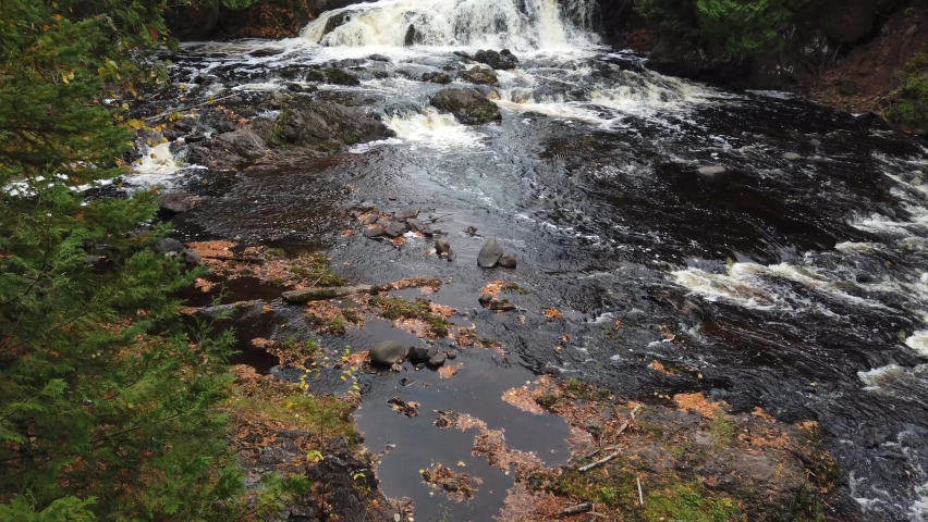 Cascades tumble down the Bad River in Copper Falls State park in autumn
