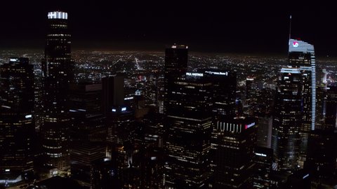 Night Aerial Shot of Downtown Los Angeles Skyline, Financial District View of DTLA, Flying Over 101 FWY, Los Angeles, California 02.23.2021