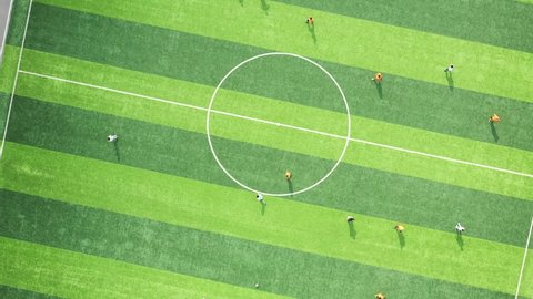 Drone footage of athletes playing on the soccer field top view