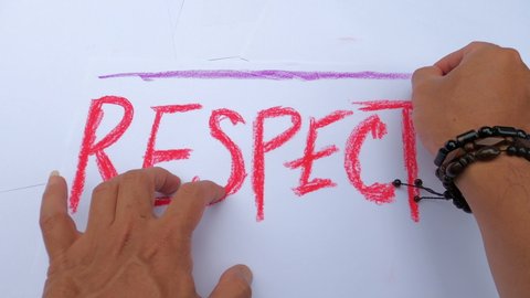 Illustration of  line on red respect text on pile blank white paper by exotic dark brown skin hands wearing unique black handmade bracelets to campaign the movement. 4k raw video clip footage.
