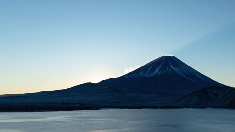 Time-Lapse Footage of the Sunrise over Mt. Fuji at Lake Motosu in Winter (copy space at left)