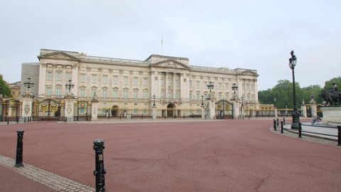 Lockdown in London, cinematic gimbal pan of Buckingham Palace entrance gates deserted, during the COVID-19 2020 pandemic.