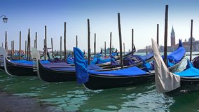 Amazing Venice Gondola parking and view to San Giorgio Maggiore, Italy. Steadycam UHD stock video