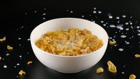 Bowl corn flakes cereal and milk for a 4k breakfast video.