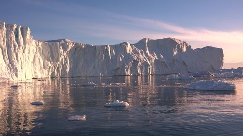 Antarctica. Drifting icebergs. Cruise to the shores of Antarctica. Antarctica Iceberg in Sunset.