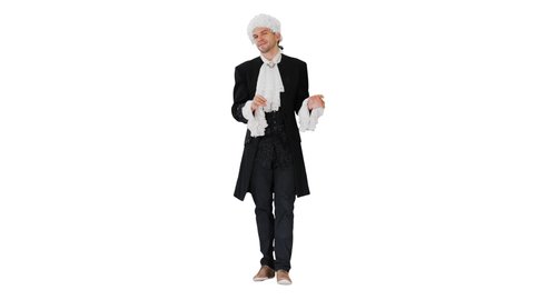 Man in old-fashioned frock coat and white wig talking and waiving with his hands theatrically looking at camera on white background.
