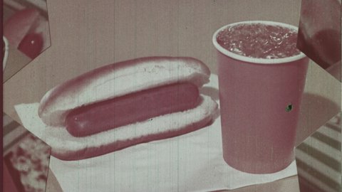 1950s Jefferson, WI . Drive-in Movie Theater Intermission Announcement. Psychedelic Swirl reveals Close up of Delicious Hot Dog. 4K Scan of Vintage Archival 35mm Film Print.  