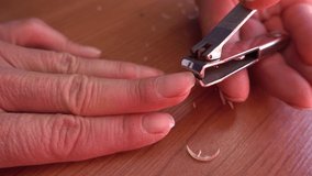 4K Self cutting of finger nails with a nail trimmer
