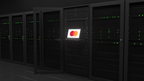 Laptop with the animation of MASTERCARD on the screen in a server room. Conceptual editorial 3d animation