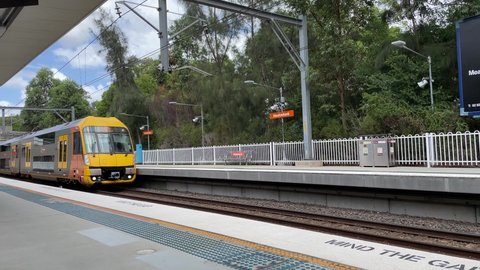 Sydney, Australia - February 14, 2021: Train coming into platform at Meadowbank Station.